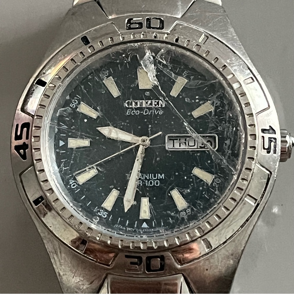 Citizen Eco-Drive Silver and Teal Blue Men’s Watch - As Is